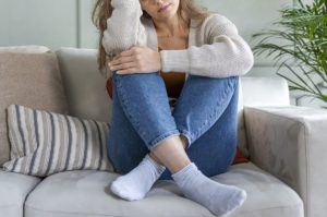 Image of a woman that looks anxious while sitting on a couch. Whether you are dealing with social anxiety or other anxiety symptoms in the Orlando area there is help. There are many different options for anxiety treatment when it comes to anxiety therapy. Contact us in Winter Park, FL today to learn more!